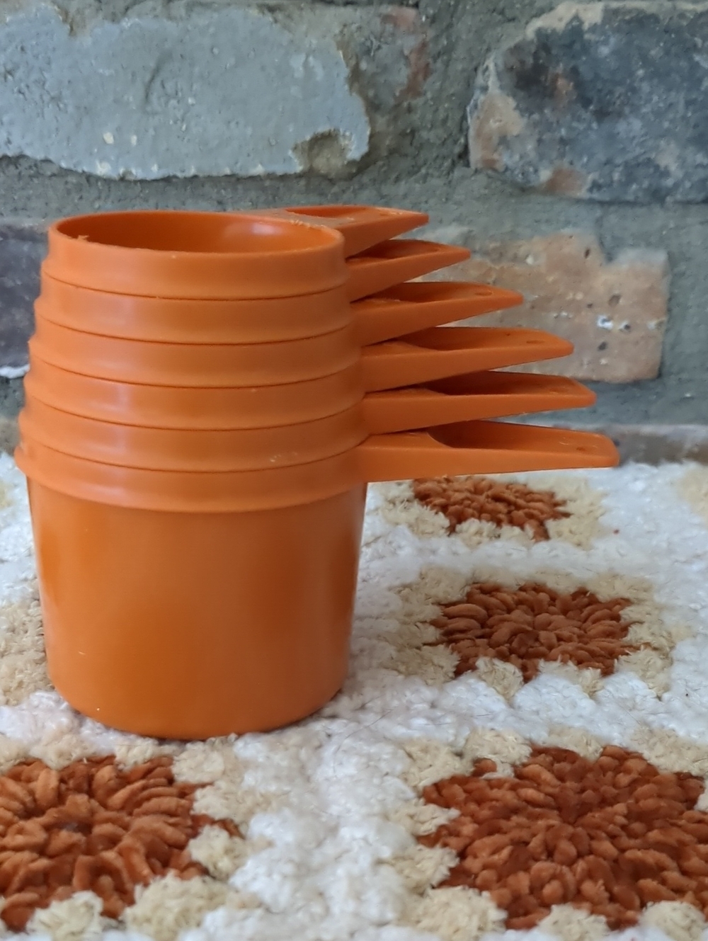 Vintage Mid Century Orange Tupperware Stackable Measuring Cup Set